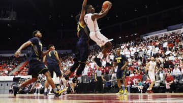 Feb 21, 2016; Pullman, WA, USA; Washington State Cougars guard Ike Iroegbu (2) goes up for a basket against California Golden Bears center Kingsley Okoroh (22) during the first half at Wallis Beasley Performing Arts Coliseum. Mandatory Credit: James Snook-USA TODAY Sports