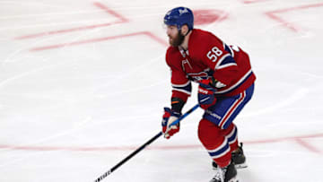 Apr 21, 2022; Montreal, Quebec, CAN; Montreal Canadiens defenseman David Savard (58) skates with the puck against Philadelphia Flyers during the third period at Bell Centre. Mandatory Credit: Jean-Yves Ahern-USA TODAY Sports