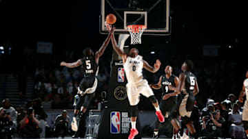 JOHANNESBURG, SOUTH AFRICA - AUGUST 5: Victor Oladipo #5 of Team Africa goes for the rebound against DeMarcus Cousins #0 of Team World in the 2017 Africa Game as part of the Basketball Without Borders Africa at the Ticketpro Dome on August 5, 2017 in Gauteng province of Johannesburg, South Africa. NOTE TO USER: User expressly acknowledges and agrees that, by downloading and or using this photograph, User is consenting to the terms and conditions of the Getty Images License Agreement. Mandatory Copyright Notice: Copyright 2017 NBAE (Photo by Nathaniel S. Butler/NBAE via Getty Images)