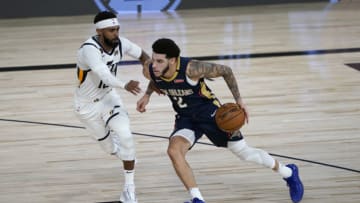 Lonzo Ball #2 of the New Orleans Pelicans drives against Mike Conley #10 of the Utah Jazz (Photo by Ashley Landis-Pool/Getty Images)