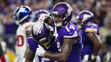 Oct 3, 2016; Minneapolis, MN, USA; Minnesota Vikings running back Jerick McKinnon (21) celebrates his touchdown with wide receiver Stefon Diggs (14) during the fourth quarter against the New York Giants at U.S. Bank Stadium. The Vikings defeated the Giants 24-10. Mandatory Credit: Brace Hemmelgarn-USA TODAY Sports