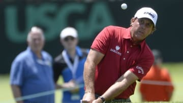 Jun 13, 2016; Oakmont, PA, USA; Phil Mickelson chips on the fourth hole during the practice rounds on Monday of the 2016 U.S. Open golf tournament at Oakmont CC. Mandatory Credit: Michael Madrid-USA TODAY Sports