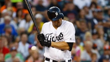 Aug 6, 2016; Detroit, MI, USA; Detroit Tigers third baseman Nick Castellanos (9) is hit by a pitch in the fourth inning against the New York Mets at Comerica Park. Mandatory Credit: Rick Osentoski-USA TODAY Sports