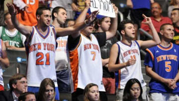 Jun 27, 2013; Brooklyn, NY, USA; New York Knicks fans cheer after Tim Hardaway Jr. (not pictured) was selected as the number twenty-four overall pick to the Knicks during the 2013 NBA Draft at the Barclays Center. Mandatory Credit: Joe Camporeale-USA TODAY Sports