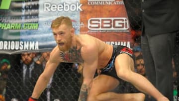 Jan 18, 2015; Boston, MA, USA; Conor McGregor during his introduction in a featherweight bout against Dennis Siver (not pictured) at UFC Fight Night at TD Garden. Mandatory Credit: Bob DeChiara-USA TODAY Sports