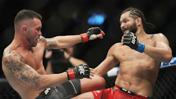 Mar 5, 2022; Las Vegas, Nevada, UNITED STATES; Colby Covington (red gloves) fights Jorge Masvidal (blue gloves) during UFC 272 at T-Mobile Arena. Mandatory Credit: Stephen R. Sylvanie-USA TODAY Sports