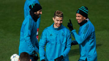 MADRID, SPAIN - FEBRUARY 13: Cristiano Ronaldo (2ndR) of Real Madrid CF jokes with his teammatesKarim Benzema (L) and Carlos Casemiro during a training session at Valdebebas training ground ahead their Round of 16 first leg UEFA Champions League match against Paris Saint-Germain Football Club on February 13, 2018 in Madrid, Spain. (Photo by Gonzalo Arroyo Moreno/Getty Images)