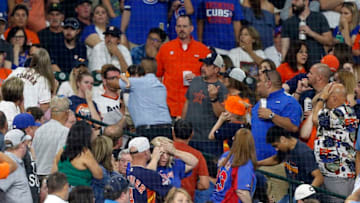 HOUSTON, TEXAS - MAY 29: A young child is rushed from the stands after being injured by a hard foul ball off the bat of Albert Almora Jr. #5 of the Chicago Cubs in the fourth inning at Minute Maid Park on May 29, 2019 in Houston, Texas. (Photo by Bob Levey/Getty Images)