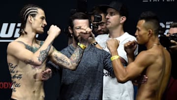LAS VEGAS, NV - MARCH 02: (L-R) Sean O'Malley and Andre Soukhamthath face off during a UFC 222 weigh-in on March 2, 2018 in Las Vegas, Nevada. (Photo by Jeff Bottari/Zuffa LLC/Zuffa LLC via Getty Images)