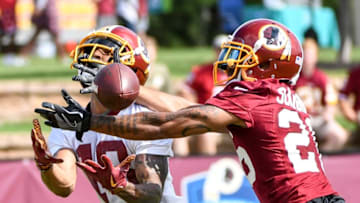 RICHMOND, VA., July 26, 2018. Washington Redskins defensive back Orlando Scandrick (26) knocks away a pass intended for wide receiver Josh Doctson (18) during training camp. (Photo by: Jonathan Newton/The Washington Post via Getty Images)