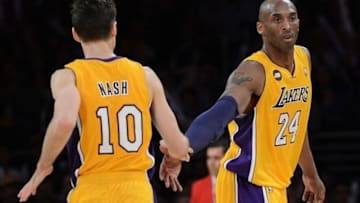 Mar 22, 2013; Los Angeles, CA, USA; Los Angeles Lakers shooting guard Kobe Bryant (24) and point guard Steve Nash (10) in the second half of the game against the Washington Wizards at the Staples Center. Wizards won 103-100. Mandatory Credit: Jayne Kamin-Oncea-USA TODAY Sports