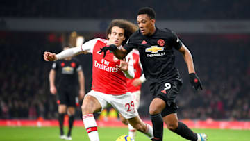 LONDON, ENGLAND - JANUARY 01: Anthony Martial of Manchester United is challenged by Matteo Guendouzi of Arsenal during the Premier League match between Arsenal FC and Manchester United at Emirates Stadium on January 01, 2020 in London, United Kingdom. (Photo by Clive Mason/Getty Images)