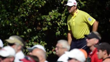 Apr 11, 2014; Augusta, GA, USA; Graeme McDowell steps out from behind the bushes on the 10th hole during the second round of the 2014 The Masters golf tournament at Augusta National Golf Club. Mandatory Credit: Michael Madrid-USA TODAY Sports