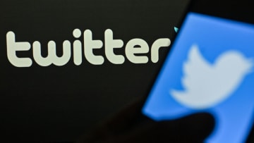 Twitter logo is displayed on a smartphone screen. (Photo Illustration by Omar Marques/SOPA Images/LightRocket via Getty Images)
