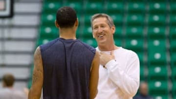 Feb 27, 2013; Salt Lake City, UT, USA; Utah Jazz assistant coach Jeff Hornacek talks with Atlanta Hawks point guard and former Jazz player Devin Harris prior to a game at EnergySolutions Arena. Mandatory Credit: Russ Isabella-USA TODAY Sports