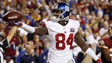 Sep 25, 2014; Landover, MD, USA; New York Giants tight end Larry Donnell (84) celebrates after scoring a touchdown against the Washington Redskins in the second quarter at FedEx Field. Mandatory Credit: Geoff Burke-USA TODAY Sports