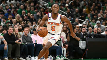 BOSTON, MASSACHUSETTS - MARCH 05: Immanuel Quickley #5 of the New York Knicks drives to the basket against the Boston Celtics during the first quarter at the TD Garden on March 05, 2023 in Boston, Massachusetts. NOTE TO USER: User expressly acknowledges and agrees that, by downloading and or using this photograph, User is consenting to the terms and conditions of the Getty Images License Agreement. (Photo by Brian Fluharty/Getty Images)