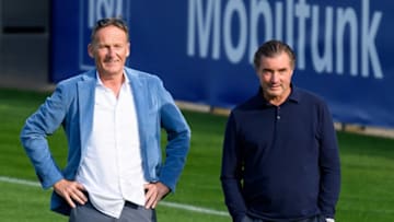 CEO Hans-Joachim Watzke of Borussia Dortmund and sporting director Michael Zorc of Borussia Dortmund look on during training (Photo by Alex Gottschalk/DeFodi Images via Getty Images)