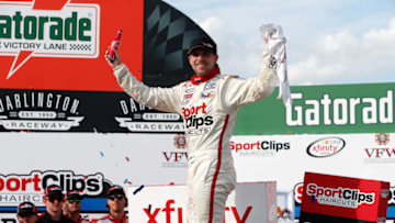 DARLINGTON, SC - SEPTEMBER 02: Denny Hamlin, driver of the #18 Sport Clips Toyota, celebrates in Victory Lane after winning the NASCAR XFINITY Series Sports Clips Haircuts VFW 200 at Darlington Raceway on September 2, 2017 in Darlington, South Carolina. (Photo by Brian Lawdermilk/Getty Images)