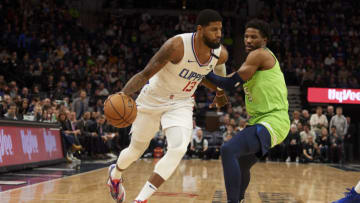 Paul George of the Los Angeles Clippers drives to the basket against Malik Beasley of the Minnesota Timberwolves. (Photo by Hannah Foslien/Getty Images)