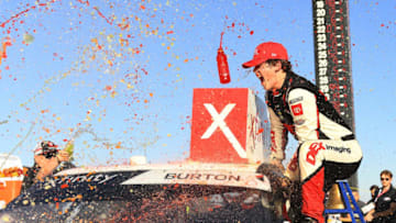FONTANA, CALIFORNIA - FEBRUARY 29: Harrison Burton, driver of the #20 Dex Imaging Toyota, celebrates in Victory Lane after winning the NASCAR Xfinity Series Production Alliance Group 300 at Auto Club Speedway on February 29, 2020 in Fontana, California. (Photo by Stacy Revere/Getty Images)