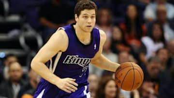 Nov 20, 2013; Phoenix, AZ, USA; Sacramento Kings guard Jimmer Fredette (7) dribbles the ball up the court in the second half of the game against the Phoenix Suns at US Airways Center. The Kings defeated the Suns 113-106. Mandatory Credit: Jennifer Stewart-USA TODAY Sports