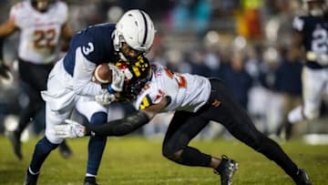 STATE COLLEGE, PA - NOVEMBER 24: DeAndre Thompkins #3 of the Penn State Nittany Lions is tackled by Antwaine Richardson #20 of the Maryland Terrapins during the first half at Beaver Stadium on November 24, 2018 in State College, Pennsylvania. (Photo by Scott Taetsch/Getty Images)