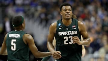 WASHINGTON, DC - MARCH 31: Xavier Tillman #23 of the Michigan State Spartans celebrates a basket against the Duke Blue Devils during the first half in the East Regional game of the 2019 NCAA Men's Basketball Tournament at Capital One Arena on March 31, 2019 in Washington, DC. (Photo by Rob Carr/Getty Images)
