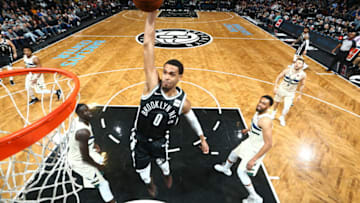 BROOKLYN, NY - FEBRUARY 4: James Webb III #0 of the Brooklyn Nets dunks against the Milwaukee Bucks on February 4, 2018 at Barclays Center in Brooklyn, New York. NOTE TO USER: User expressly acknowledges and agrees that, by downloading and/or using this photograph, user is consenting to the terms and conditions of the Getty Images License Agreement. Mandatory Copyright Notice: Copyright 2018 NBAE (Photo by Nathaniel S. Butler/NBAE via Getty Images)