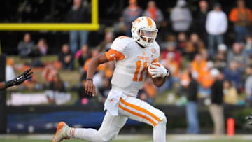 NASHVILLE, TN - NOVEMBER 29: Joshua Dobbs #11 of the Tennessee Volunteers plays against the Vanderbilt Commodores at Vanderbilt Stadium on November 29, 2014 in Nashville, Tennessee. (Photo by Frederick Breedon/Getty Images)
