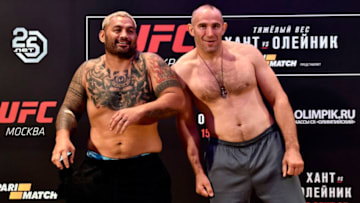 MOSCOW, RUSSIA - SEPTEMBER 14: (L-R) Opponents Mark Hunt of New Zealand and Aleksei Oleinik of Russia interact during the UFC Fight Night weigh-in event at Hyatt Regency Moscow Petrovsky Park on September 14, 2018 in Moscow, Russia. (Photo by Jeff Bottari/Zuffa LLC/Zuffa LLC via Getty Images)