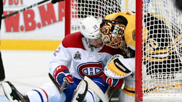 BOSTON, MA - JANUARY 17: Montreal Canadiens winger Jonathan Drouin (92) checks with Boston Bruins goalie Tuukka Rask (40) after crashing into him during a game between the Boston Bruins and the Montreal Canadiens on January 17, 2018, at TD Garden in Boston, Massachusetts. The Bruins defeated the Canadiens 4-1. (Photo by Fred Kfoury III/Icon Sportswire via Getty Images)