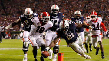 AUBURN, AL - NOVEMBER 11: Kerryon Johnson #21 of the Auburn Tigers dives for a touchdown past Deandre Baker #18 of the Georgia Bulldogs at Jordan Hare Stadium on November 11, 2017 in Auburn, Alabama. (Photo by Kevin C. Cox/Getty Images)