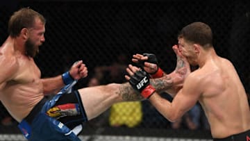 OTTAWA, ON - MAY 04: (L-R) Donald Cerrone kicks Al Iaquinta in their lightweight bout during the UFC Fight Night event at Canadian Tire Centre on May 4, 2019 in Ottawa, Ontario, Canada. (Photo by Jeff Bottari/Zuffa LLC/Zuffa LLC via Getty Images)