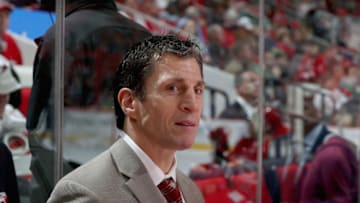 RALEIGH, NC - NOVEMBER 13: Rod Brind'Amour assitant coach of the Carolina Hurricanes watches action on the ice from the bench area during an NHL game against the Dallas Stars on November 13, 2017 at PNC Arena in Raleigh, North Carolina. (Photo by Gregg Forwerck/NHLI via Getty Images)