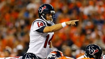 Aug 23, 2014; Denver, CO, USA; Houston Texans quarterback Ryan Fitzpatrick (14) calls a play in the second quarter against the Denver Broncos at Sports Authority Field at Mile High. The Texans defeated the Broncos 18-17. Mandatory Credit: Isaiah J. Downing-USA TODAY Sports