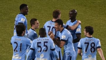 May 27, 2015; Toronto, Ontario, Canada; Manchester City players surround midfielder George Evans as they celebrate his second half goal in a 1-0 win over Toronto FC in an international club friendly at BMO Field. Mandatory Credit: Dan Hamilton-USA TODAY Sports
