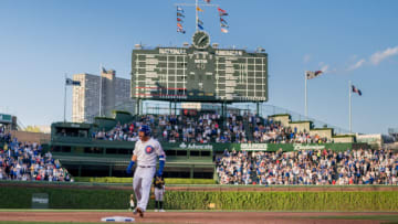 CHICAGO, IL - May 16: Willson Contreras of the Chicago Cubs celebrates as he rounds third base after hitting his 100th career home run, a grand slam, against the Pittsburgh Pirates at Wrigley Field on May 16, 2022 in Chicago, Illinois. (Photo by Matt Dirksen/Getty Images)