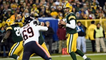 Nov 9, 2014; Green Bay, WI, USA; Green Bay Packers quarterback Aaron Rodgers (12) looks to pass in the first quarter during the game against the Chicago Bears at Lambeau Field. Mandatory Credit: Benny Sieu-USA TODAY Sports