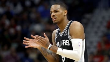 NEW ORLEANS, LOUISIANA - MARCH 26: Dejounte Murray #5 of the San Antonio Spurs reacts after a play during the fourth quarter of an NBA game against the New Orleans Pelicans at Smoothie King Center on March 26, 2022 in New Orleans, Louisiana. San Antonio Spurs won the game 107 - 103. NOTE TO USER: User expressly acknowledges and agrees that, by downloading and or using this photograph, User is consenting to the terms and conditions of the Getty Images License Agreement. (Photo by Sean Gardner/Getty Images)