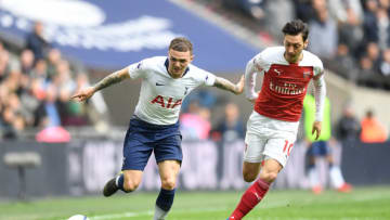 LONDON, ENGLAND - MARCH 02: Kieran Trippier of Tottenham Hotspur battles for possession with Mesut Ozil of Arsenal during the Premier League match between Tottenham Hotspur and Arsenal FC at Wembley Stadium on March 02, 2019 in London, United Kingdom. (Photo by Michael Regan/Getty Images)