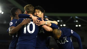 BRIGHTON, ENGLAND - APRIL 17: Harry Kane of Tottenham Hotspur celebrates with Heung-Min Son of Tottenham Hotspur after scoring his sides first goal during the Premier League match between Brighton and Hove Albion and Tottenham Hotspur at Amex Stadium on April 17, 2018 in Brighton, England. (Photo by Mike Hewitt/Getty Images)