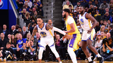 SAN FRANCISCO, CA - OCTOBER 5: D'Angelo Russell #0 of the Golden State Warriors plays defense against Anthony Davis #3 of the Los Angeles Lakers during a pre-season game on October 5, 2019 at Chase Center in San Francisco, California. NOTE TO USER: User expressly acknowledges and agrees that, by downloading and/or using this Photograph, user is consenting to the terms and conditions of the Getty Images License Agreement. Mandatory Copyright Notice: Copyright 2019 NBAE (Photo by Noah Graham/NBAE via Getty Images)