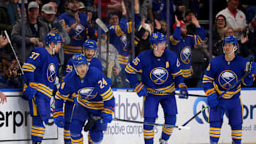 Mar 6, 2023; Buffalo, New York, USA; Buffalo Sabres center Dylan Cozens (24) celebrates a goal with teammates during the third period against the Edmonton Oilers at KeyBank Center. Mandatory Credit: Timothy T. Ludwig-USA TODAY Sports