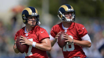 Jul 31, 2016; Irvine, CA, USA; Los Angeles Rams quarterbacks Case Keenum (17) and Jared Goff (16) throw passes at training camp at UC Irvine. Mandatory Credit: Kirby Lee-USA TODAY Sports