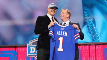 ARLINGTON, TX - APRIL 26: Josh Allen of Wyoming poses with NFL Commissioner Roger Goodell after being picked