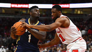 Zion Williamson #1 of the New Orleans Pelicans is fouled by Thaddeus Young (Photo by Stacy Revere/Getty Images)