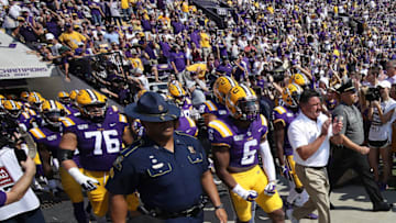 BATON ROUGE, LOUISIANA - OCTOBER 05: Head coach Ed Ogeron of the LSU Tigers leads his team onto the field prior to the game against the Utah State Aggies at Tiger Stadium on October 05, 2019 in Baton Rouge, Louisiana. (Photo by Chris Graythen/Getty Images)