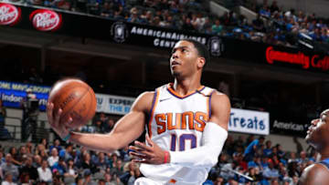 DALLAS, TX - APRIL 10: Shaquille Harrison #10 of the Phoenix Suns shoots the ball during the game against the Dallas Mavericks on April 10, 2018 at the American Airlines Center in Dallas, Texas. NOTE TO USER: User expressly acknowledges and agrees that, by downloading and or using this photograph, User is consenting to the terms and conditions of the Getty Images License Agreement. Mandatory Copyright Notice: Copyright 2018 NBAE (Photo by Danny Bollinger/NBAE via Getty Images)