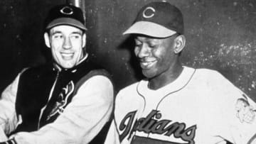 CLEVELAND - 1965. Satchel Paige, right, pitcher for the Cleveland Indians, talks with fellow moundsman Bob Feller before a game at Municipal Stadium in 1965. (Photo by Mark Rucker/Transcendental Graphics, Getty Images)